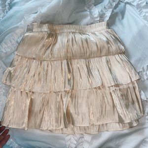 “‘Metallic” Light gold mini skirt